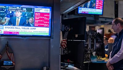 Traders work on the floor of the New York Stock Exchange on April 10, 2024, in New York City.