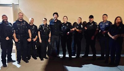 Famous actor Keanu Reeves takes photo with Airway Heights Police Department