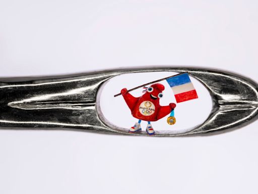 Renowned micro-sculptor unveils world’s smallest Olympic mascot for Paris 2024