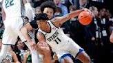 Hauser scores 22 points in Michigan State's easy victory