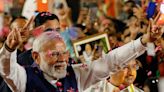 Modi claims a historic third term but his power is thrown into uncertainty