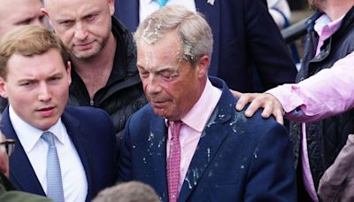 Woman arrested after drink thrown at Nigel Farage