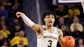 Michigan basketball's Jaelin Llewellyn celebrates with team after ACL surgery