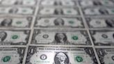 Dollar eases after strong labor market reports