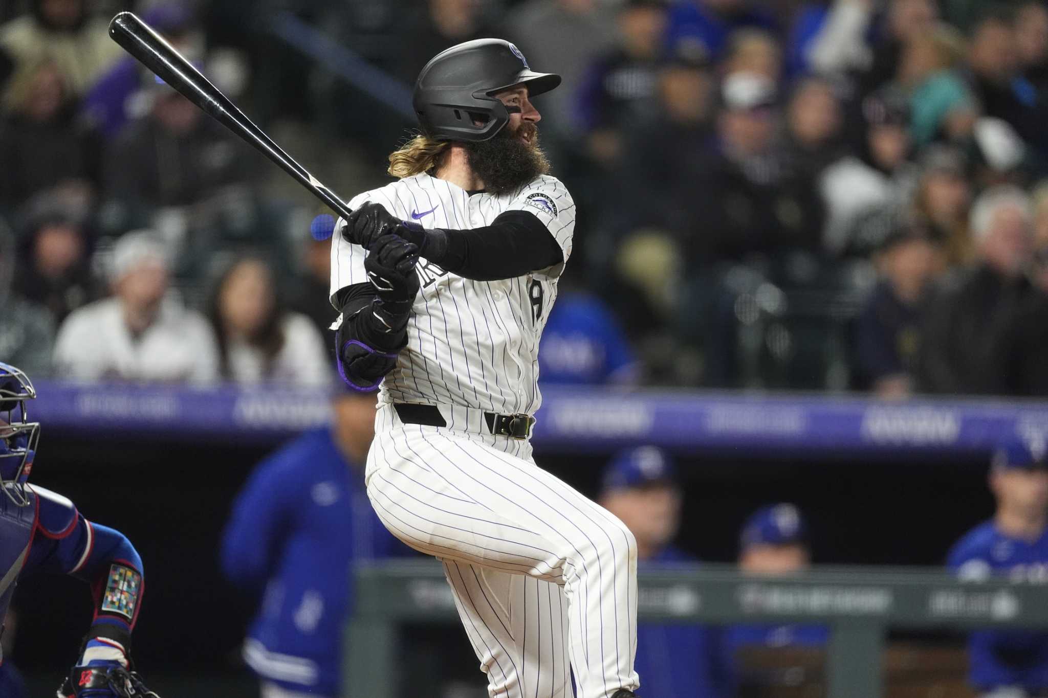 Charlie Blackmon's 2-run double in the 8th inning leads Rockies past Rangers 4-2