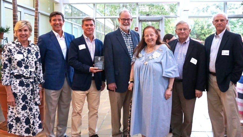 Former science teacher honored at Athens Academy with Robert Chambers Award