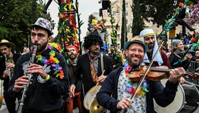 Smiling Through Tears: Hostage Families Lead Jerusalem Purim Parade