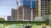 Chinese Mega Cities Loosen Homebuying Rules as Aid Spreads