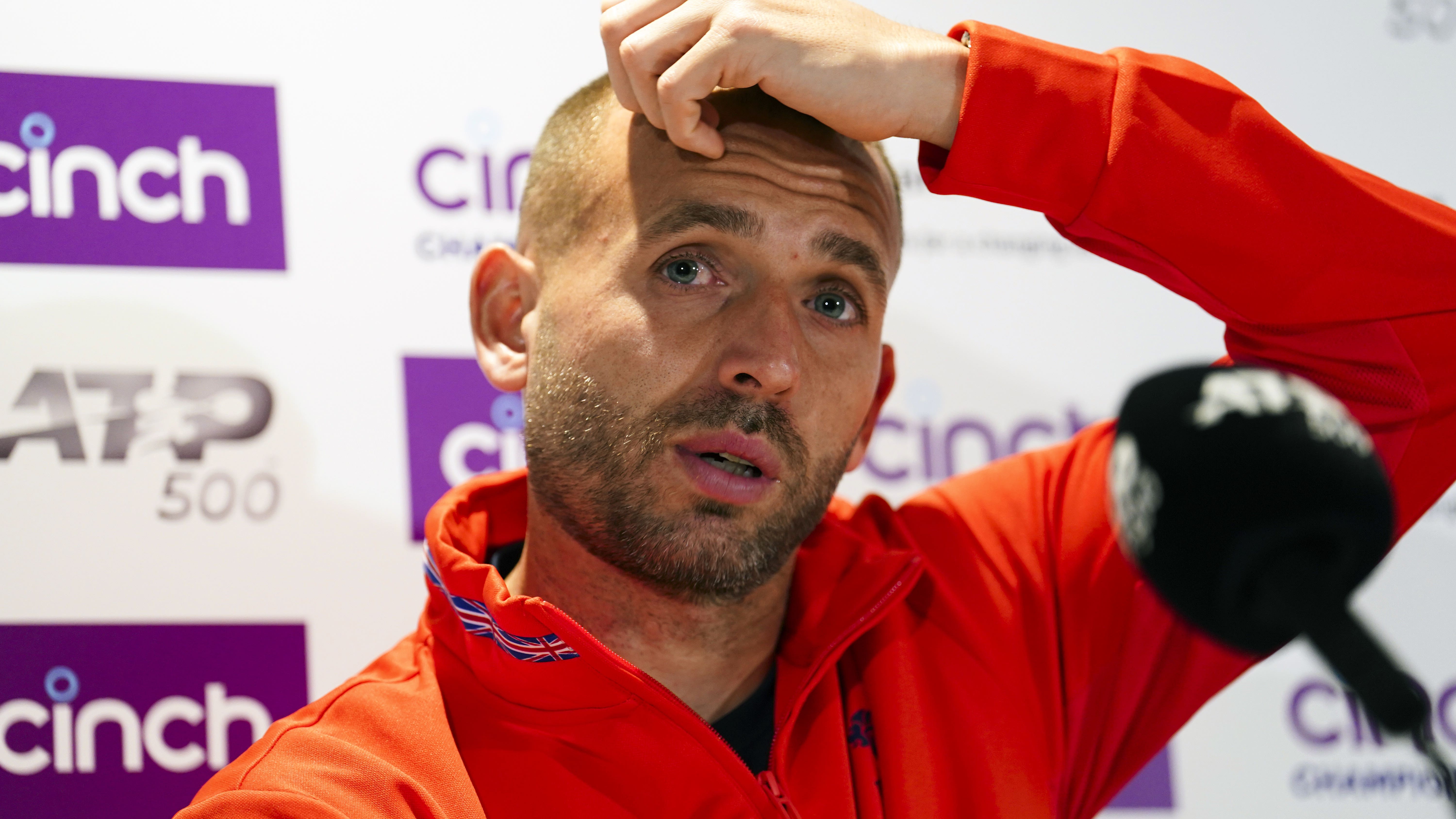 Dan Evans retires during opening match at Queen’s after slipping on court