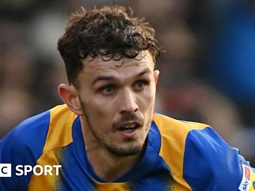 Tom Flanagan: Colchester sign former Shrewsbury defender