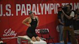 While Simone Biles competes across town, Paralympic star Jessica Long rolls at swimming trials