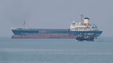 Oman says crew member of capsized tanker found dead and nine rescued