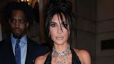 The Neckline of Kim Kardashian’s Lace-Up Crop Top Nearly Plunged to Her Belly Button