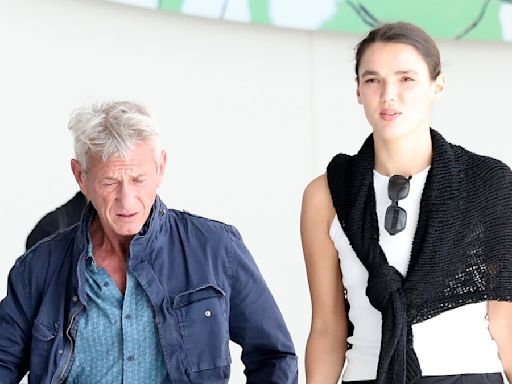 Sean Penn and his statuesque girlfriend Valeria Nicov land at LAX