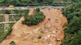 Death toll jumps to at least 48 as a search continues in southern China highway collapse