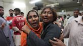 Pakistani police arrest 8 after deadly Ramadan food stampede