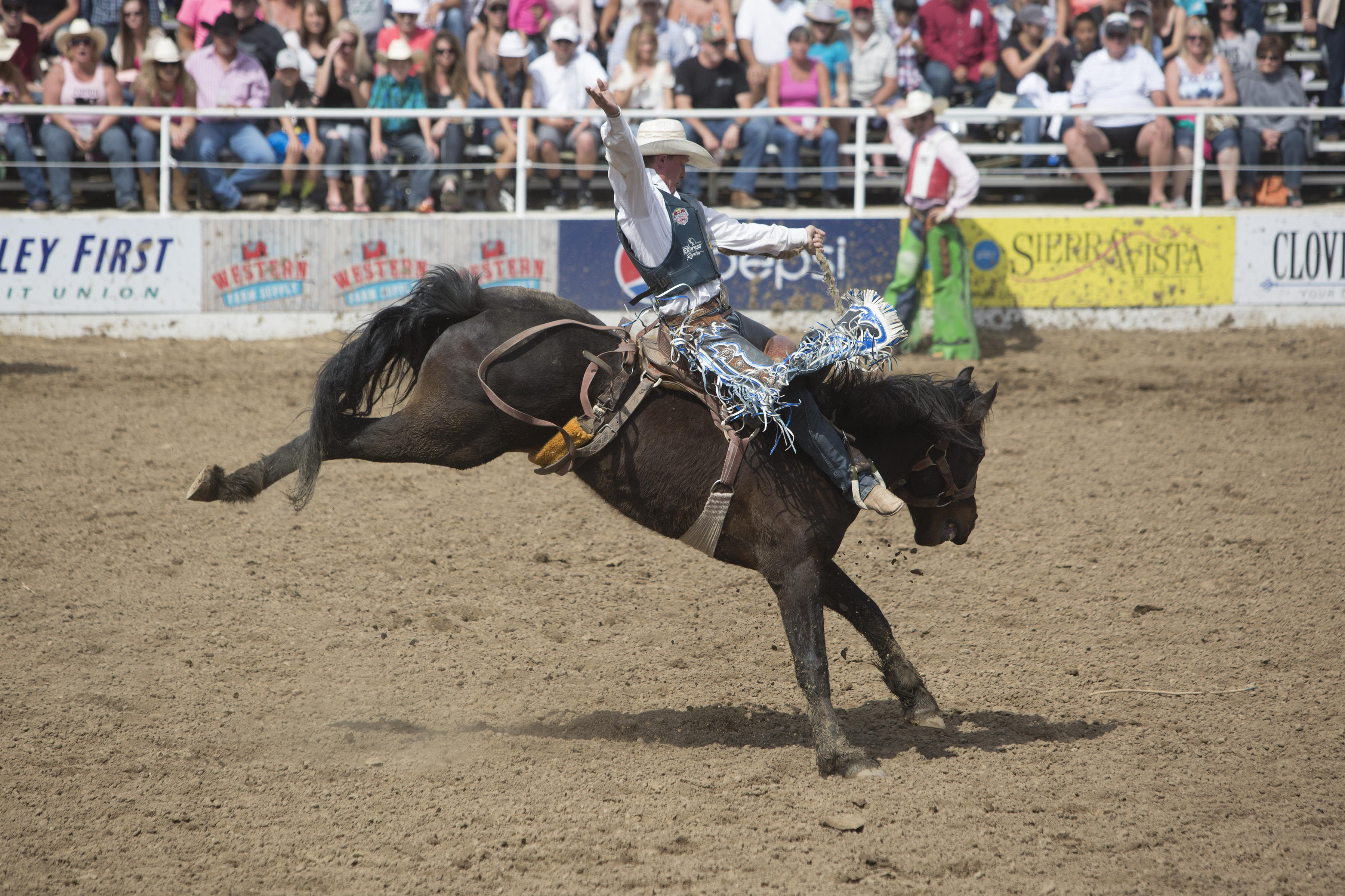 Rodeo star Spencer Wright's son opens eyes days after river accident