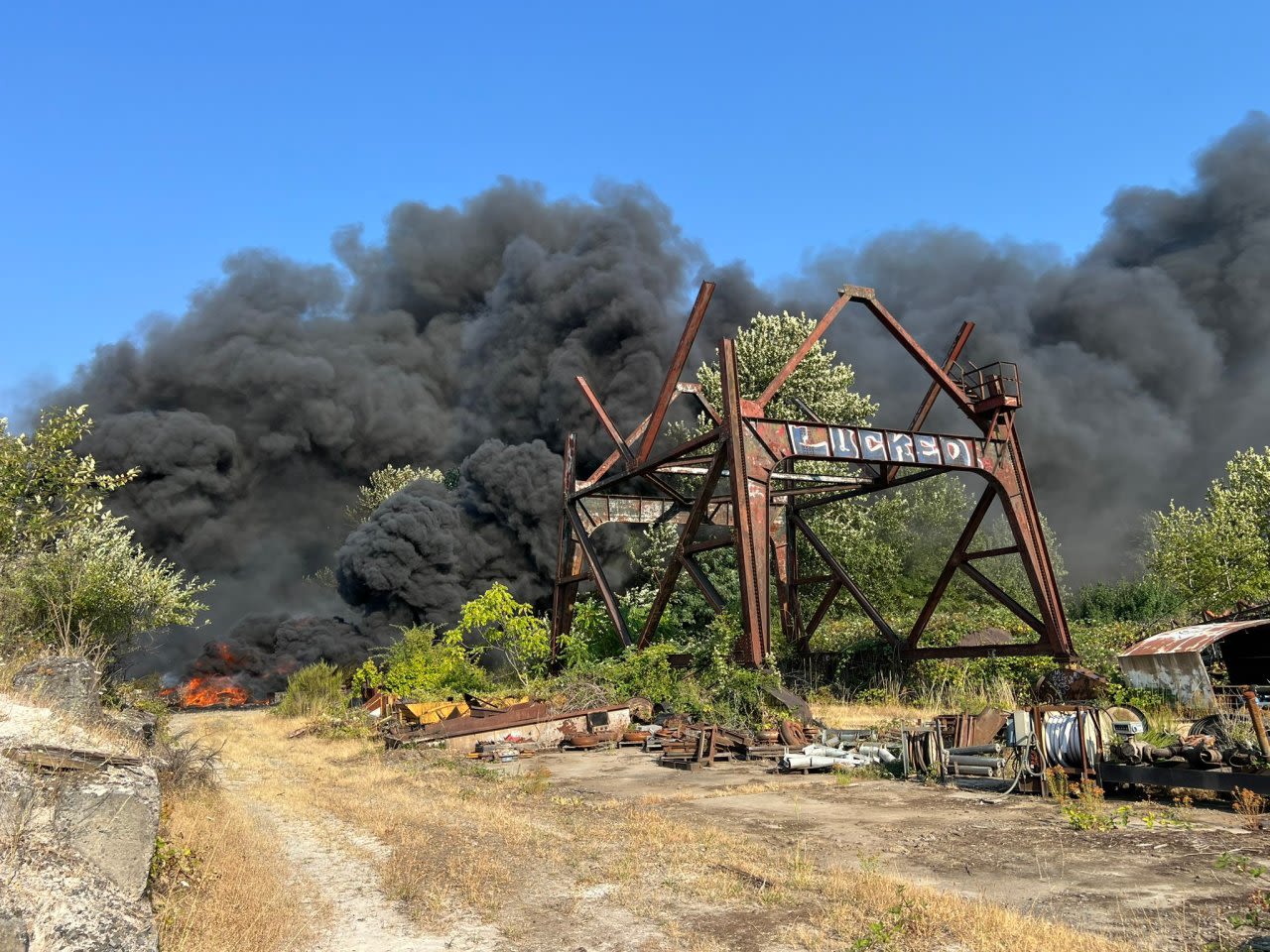 Dark smoke billows on Ross Island due to large fire in abandoned structure