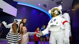 First graders receive out-of-this-world greeting at Lohman Planetarium