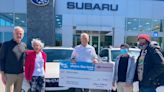 Subaru of Macon raises more than $19,000 for ‘food, laundry, showers,’ more