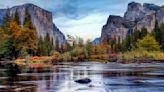 Yosemite tourist clambers over safety barrier for a better view of waterfall