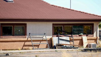 Colorado funeral home owners accused of storing 190 decaying bodies are charged with Covid fraud