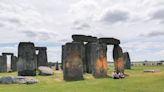 Climate protesters arrested after painting Stonehenge monument orange