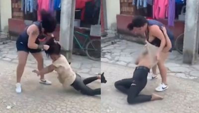 Watch: Woman beats lady, rips her clothes for allegedly sleeping with her husband in Viral Video, Netizens react