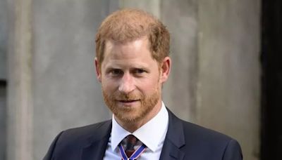 Prince Harry breaks silence just hours before he accepts controversial award he was urged to decline