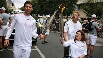 Journalist wounded in Israeli strike on Lebanon carries Olympic torch in France