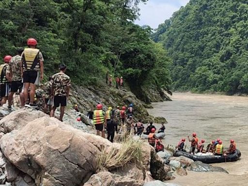 Rescuers recover body of Indian from two buses swept away in mudslide in Nepal | World News - The Indian Express