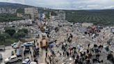 Analysis: Syria rebuilding hopes dim as war enters year 13