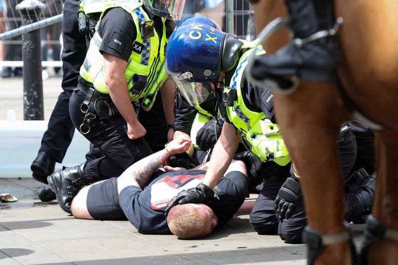 Dozens arrested after UK protests turn violent in wake of child murders