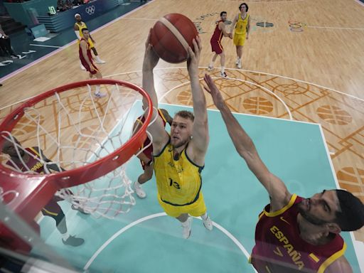 Landale scores 20 points, Australia powers past Spain 92-80 to open Olympic basketball tournament