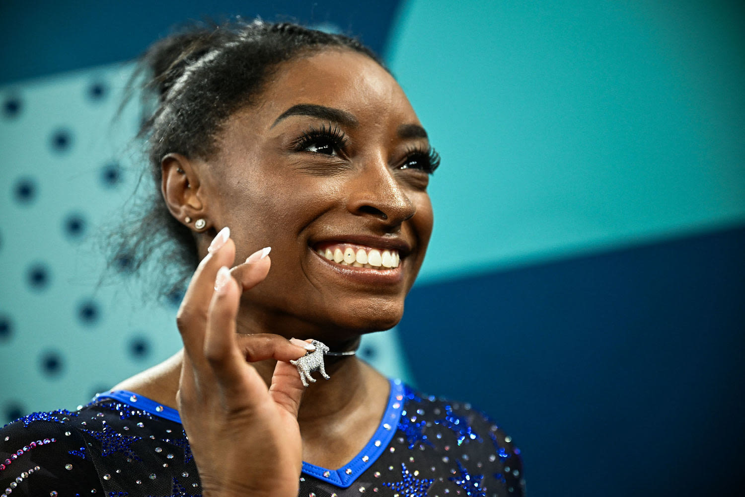 Simone Biles cements her GOAT status in Paris with ... a diamond goat necklace