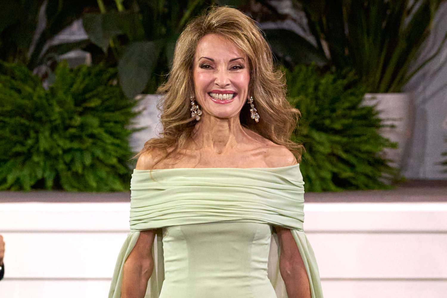 Susan Lucci, 77, Commands Catwalk in Glam Green Gown at Dennis Basso's New York Fashion Week Show