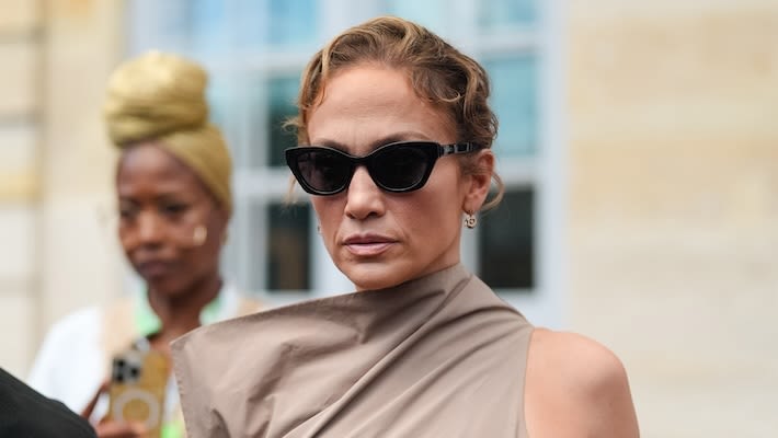 Jennifer Lopez Spotted On A Commercial Flight, Made Fun Of, Defended