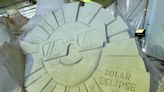 Solar eclipse sand sculpture built at Sugar Sand Festival in Clearwater Beach