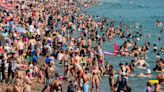 Families enjoy day out at jam-packed beaches on hottest day of 2024