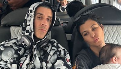 Travis Barker Reacts to Leaked Photo of His and Kourtney Kardashian's Baby Rocky - E! Online