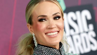 Carrie Underwood sports wild hair in tearful photo re-posted following American Idol news