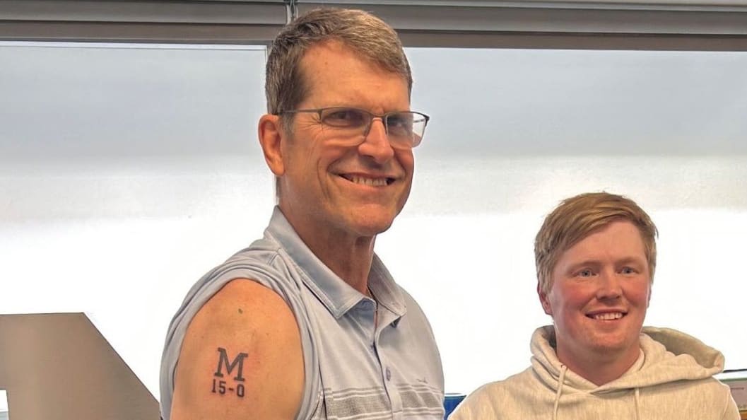 Jim Harbaugh Keeps Promise, Gets Tattoo