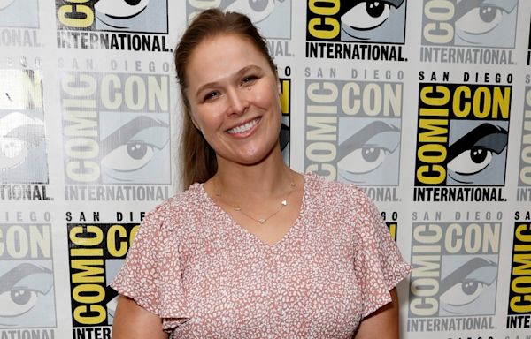 Ronda Rousey Couldn’t Resist Making Pregnancy Announcement At Comic-Con