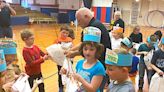 Tree and a treat: Millersburg first-graders plant a memory, topping it off with ice cream