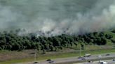 Grass fire burns 20 acres along Turnpike in SW Miami-Dade