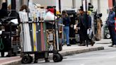 Zombies take to the roof, fans wait below as 'Walking Dead" filming begins downtown