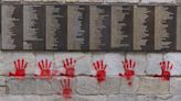 Paris Holocaust memorial hit with red hand graffiti