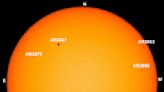 Giant sunspot region now visible in eclipse glasses!