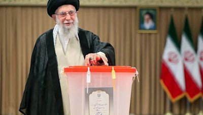 Iran's Supreme Leader Ayatollah Ali Khamenei votes during the presidential election in Tehran