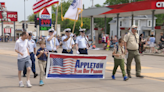 Veterans being recruited to march in a group in Appleton Flag Day Parade